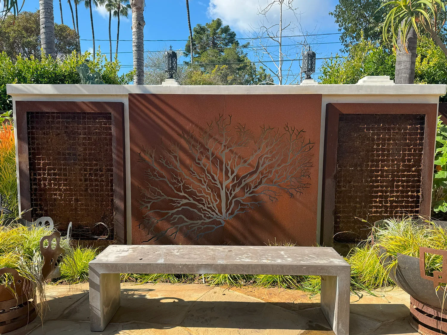 Before photo of Brentwood, CA residence space. Two empty and rusted steel walls.